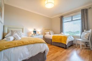 Coral Gables Guesthouse & Campsite客房内的一张或多张床位