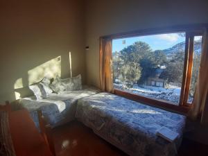 Lago Mistico客房内的一张或多张床位