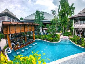 查汶Chaweng Garden Beach Resort - SHA Plus的度假村游泳池的图片