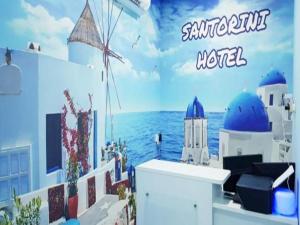 马六甲Santorini Hotel Melaka的 ⁇ 染一个海洋的圣托里尼酒店