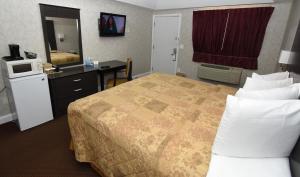Country View Inn & Suites Atlantic City客房内的一张或多张床位