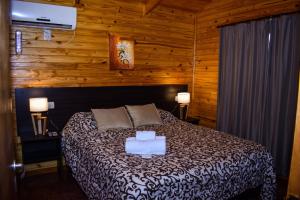 卡瓦尼亚斯多拉利亚山林小屋客房内的一张或多张床位
