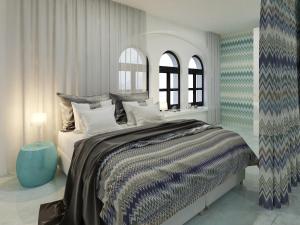 波兹南城市公园公寓酒店的一间卧室设有一张大床和两个窗户。