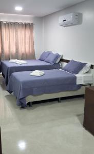 Flats Grangeiro客房内的一张或多张床位