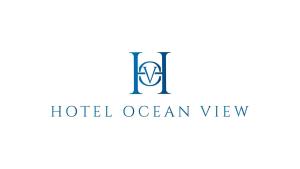圣菲利佩Hotel Ocean View & Restaurante Seafood的酒店海景标志