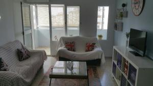 Duplex en Huelva a 15 minutos en coche de las mejores playas de España的休息区