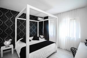 维基亚特勒克帕尼亚酒店客房内的一张或多张床位
