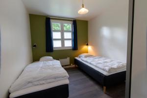 Østersø kystlejligheder客房内的一张或多张床位