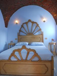 第勒塔卢克索别墅酒店客房内的一张或多张床位