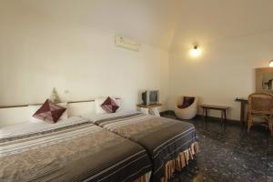 沙努尔阿里特海滩度假别墅酒店的相册照片