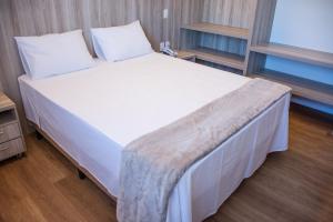 Boa Vista Hotel客房内的一张或多张床位