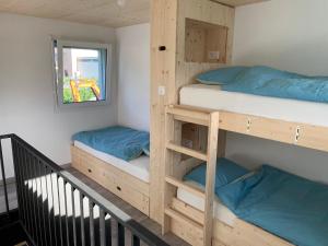 mytinyhome客房内的一张或多张床位