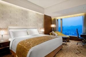 重庆凯宾斯基酒店客房内的一张或多张床位