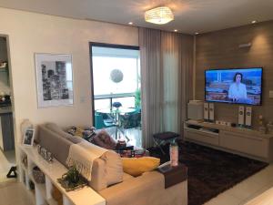 Apartamento Luxo Le Parc的休息区