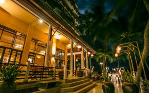 班佩罗勇度假酒店的一座棕榈树建筑