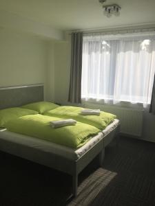 Garni Hotel 31客房内的一张或多张床位
