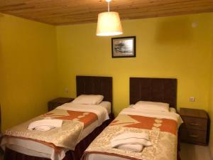 阿索斯卡迪伽酒店客房内的一张或多张床位