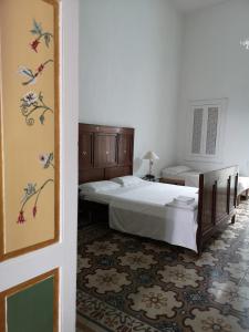 B&B Palazzo Antonelli客房内的一张或多张床位