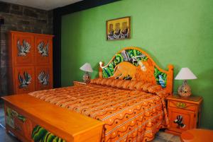 波萨达香格里拉卡瑟纳科尔特斯精品酒店客房内的一张或多张床位