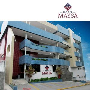 卡鲁阿鲁Hotel Maysa Caruaru的酒店可能在大楼前方标有标志