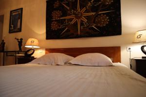 蒂勒斯酒庄酒店客房内的一张或多张床位
