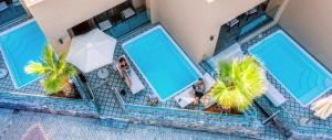 Villaggio Boutique Hotel Hersonissos - Adults Only内部或周边的泳池