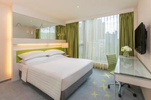 香港荃湾帝盛酒店客房内的一张或多张床位