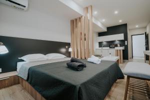 Unique Experience Apartment’s客房内的一张或多张床位