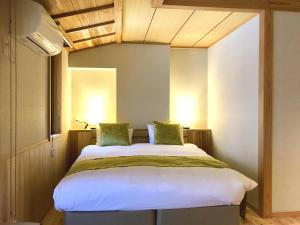 京町家樱花邸日式旅馆客房内的一张或多张床位