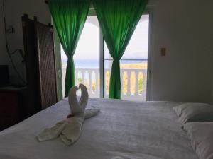 Peaceful Ocean View Studio客房内的一张或多张床位