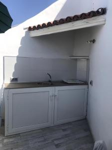 wonderful white appartament in las Tortugas的厨房或小厨房