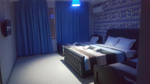 Hotel Cruise客房内的一张或多张床位