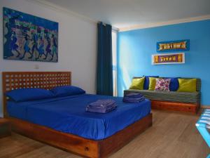 Suite Mariposa Sospesa Sul Mare客房内的一张或多张床位