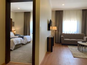 Tripper Inn Hotel客房内的一张或多张床位