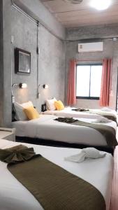 涛岛白堡旅舍 客房内的一张或多张床位