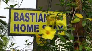 科钦巴斯蒂安寄宿家庭旅馆的标语是说家中是野兽主义者,还有一朵黄色的花