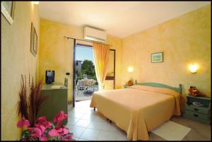 Albergo Residenziale Gli Ontani客房内的一张或多张床位