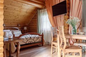 贝拉亚雷卡达科夫斯卡娅旅游度假屋客房内的一张或多张床位