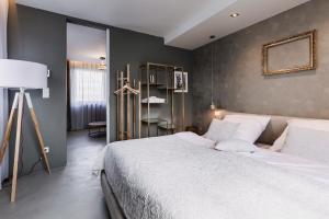 VILLA BRICOLA - Boutique Apartments客房内的一张或多张床位