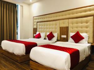 Hotel BKC Garden - Near US Embassy Bkc Mumbai客房内的一张或多张床位