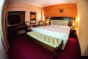 Hotel Trei Brazi客房内的一张或多张床位