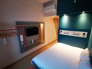 ibis budget Itagui客房内的一张或多张床位