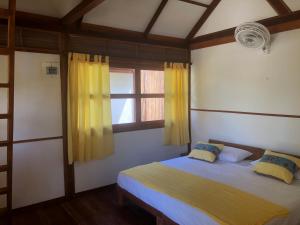 Nubá Boutique Hostel Palomino客房内的一张或多张床位