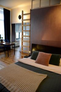 Bacchus Antwerpen - Rooms & Apartments客房内的一张或多张床位