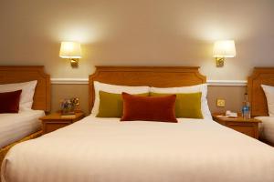 棕榈庭酒店客房内的一张或多张床位