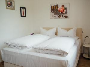 加尼阿梅高尔霍夫酒店客房内的一张或多张床位