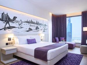 Mercure Dubai Barsha Heights Hotel Suites And Apartments客房内的一张或多张床位