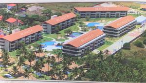 塔曼达雷Carneiros Beach Resort Flat的画画家绘制酒店大楼