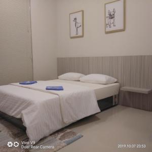 SleepRest @ The Home Shoutlink客房内的一张或多张床位