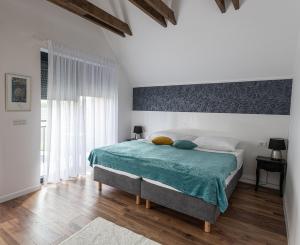 B&B Villa Dolina Plitvice客房内的一张或多张床位